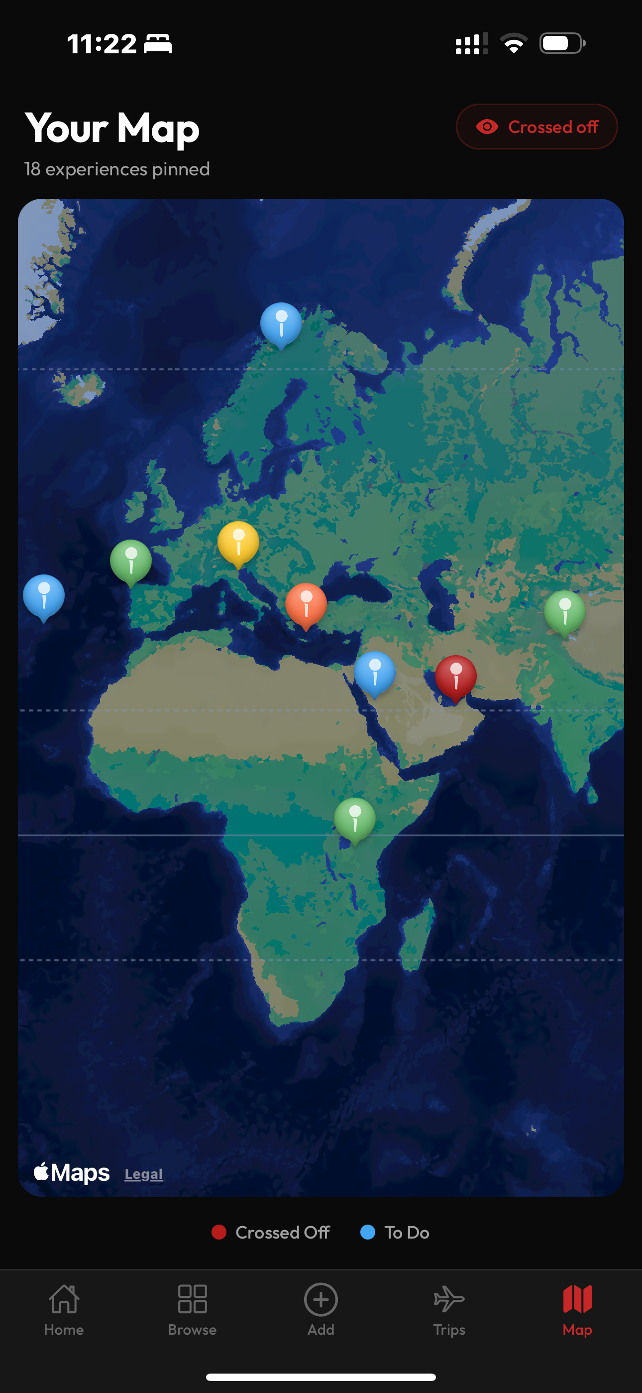 World map with color-coded bucket list pins